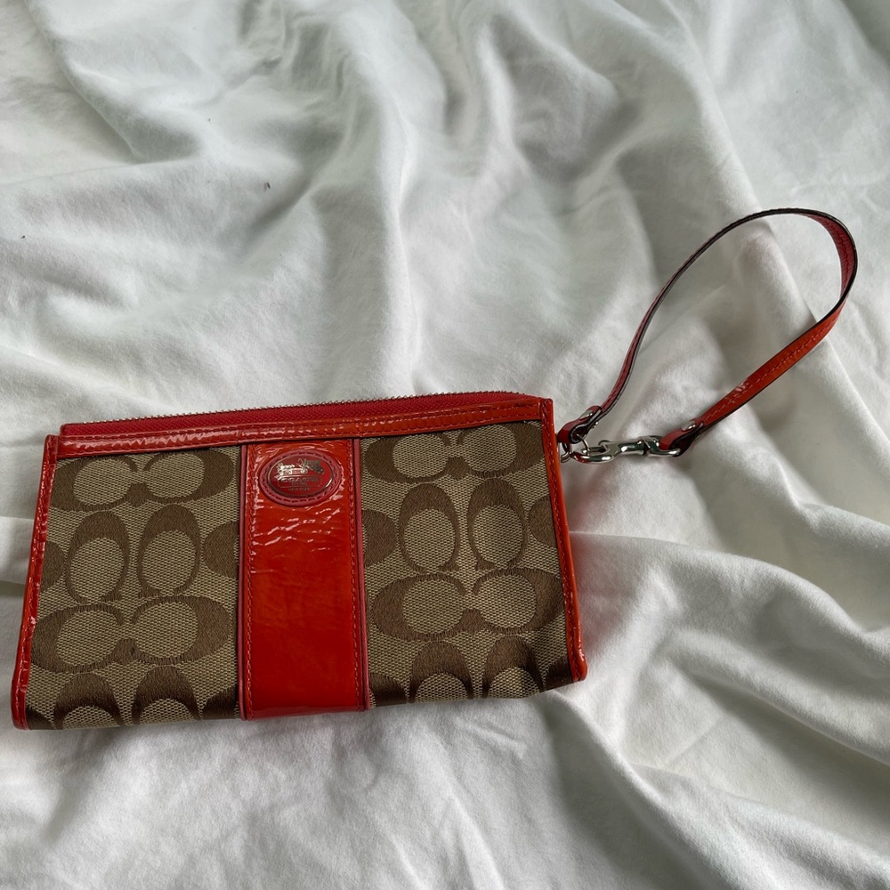 Coach zippered wallet. Used, great condition